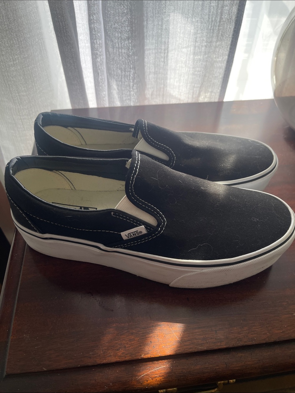 Vans Black and White Slip-On Canvas Sneakers